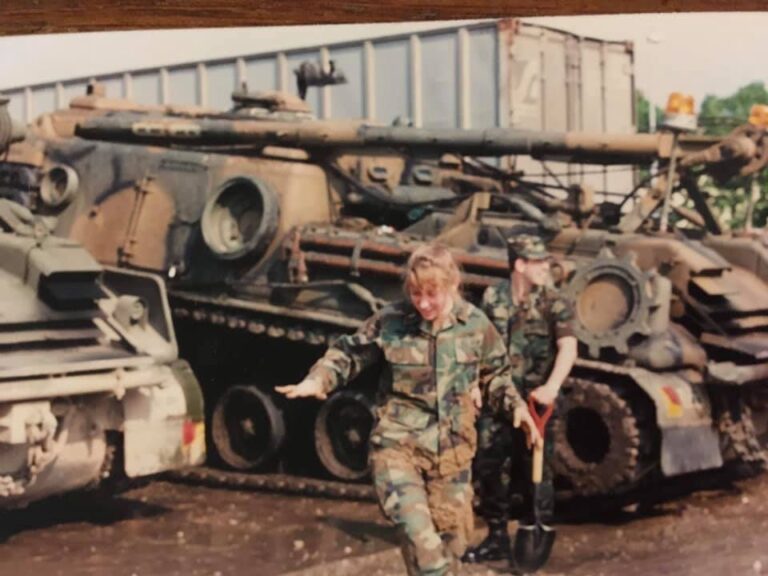 I'm rinsing my muddy boots at the washrack in about 1990 with an M88 Armored Recovery Vehicle in the background